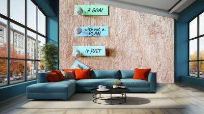 Inspirational and Motivational Concept - A goal without a plan is just a wish text on note paper background. Stock photo. Wall mural