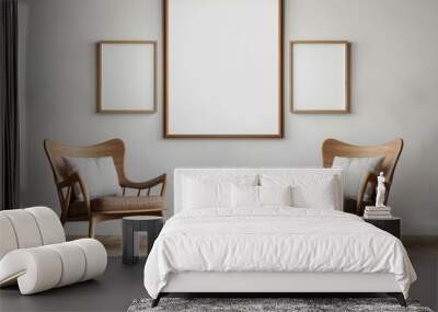 Two Wooden Armchairs with Cushions and Frames on a White Wall Wall mural