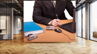 Businessman with laptop and calculator Wall mural