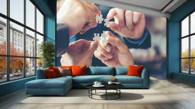 Businessman team work holding two jigsaw connecting couple puzzle piece for matching to goals target, success and start up new project in office, select focus. Business Concept. Wall mural