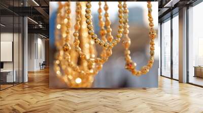 Golden jewelry at traditional Emirati market Wall mural