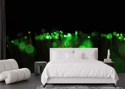 Blurred glowing spots on green shades Wall mural