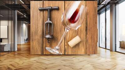 Close up glass of red wine on wooden background Wall mural