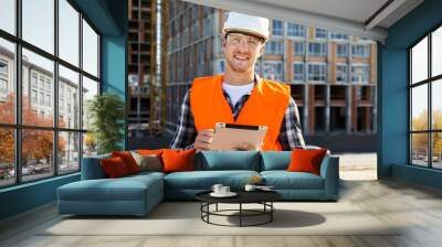 Medium shot construction engineer using tablet Wall mural