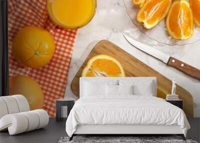 Slices of orange on wooden board Wall mural