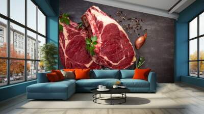 Raw T Bone steak on wooden board prepared to Grill  Wall mural