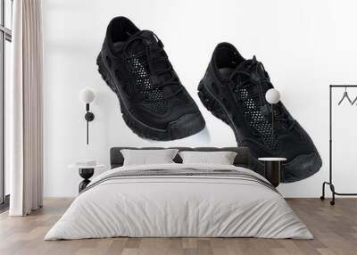 black ventilated sports shoes for men on white background Wall mural