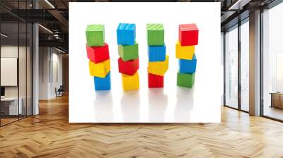 colorful wooden toy blocks stack up on a white background Wall mural