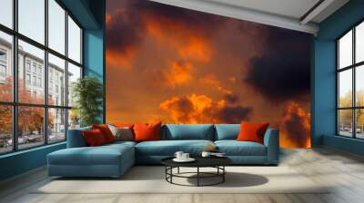 orange dark clouds in the sky, sunset time Wall mural