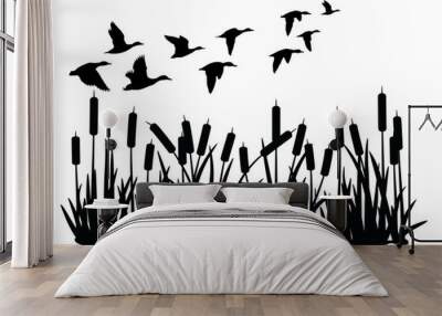 vector silhouette of duck bird flock flight over marsh herbs isolated on white background. group of wild ducks and typhaceae marsh herb with leaves and spike flowers. Wall mural