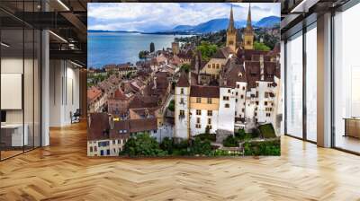 Switzerland travel and scenic places. Aerial drone view of Neuchatel charming town and impressive medieval castle overlooking the lake Wall mural