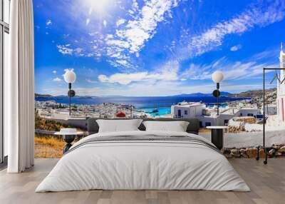 Traditional Greece. Cyclades, beautiful Mykonos island. Panoramic view of old town with windmill . Greek summer holidays Wall mural