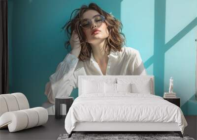 Model With White Outfit On Blue Background Wall mural