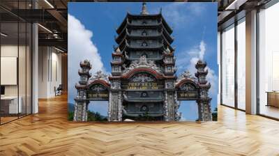 The statue of buddha in Linh Ung Pagoda, Da Nang, Vietnam.Arch at the Linh Ung Pagoda Wall mural