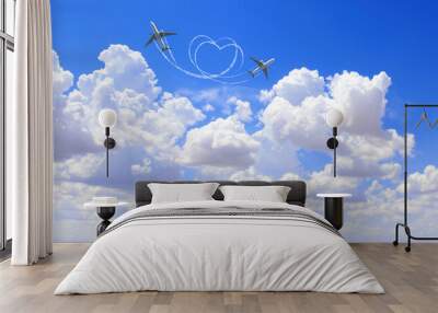 Horizontal nature background with two aircrafts draw a heart in the sky. Flight route of aircraft in shape of a heart Wall mural