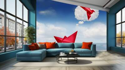 Dreaming Of Change and success Visualization as a symbol of ambition or dream concept to innovate and invent representing business growth and transformation as a paper boat and origami bird flying. Wall mural