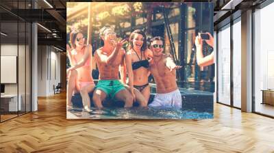 group of friends together in the swimming pool leisure Wall mural