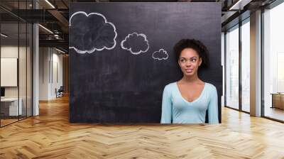 Smiling afro-american woman with cloud formed dialog on Wall mural