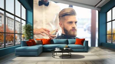 young man in barbershop hair care service concept Wall mural