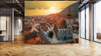 Aerial drone view of the The Black Church in Brasov at sunset, Romania Wall mural