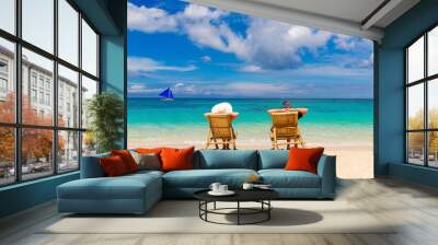 Beach summer couple on island vacation holiday relax in the sun Wall mural