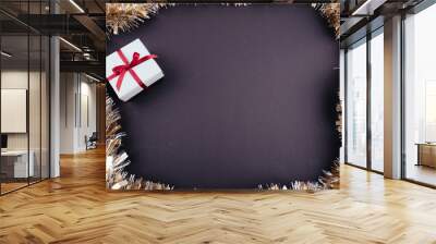 Christmas New Year holiday background tinsel gift box dark Wall mural