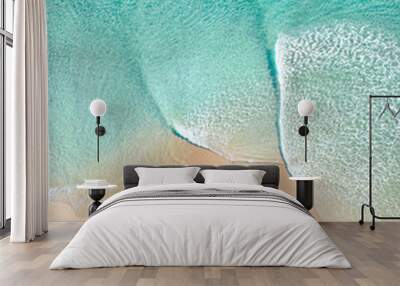 Aerial of a beach with beautiful waves, white sand and ocean textures Wall mural