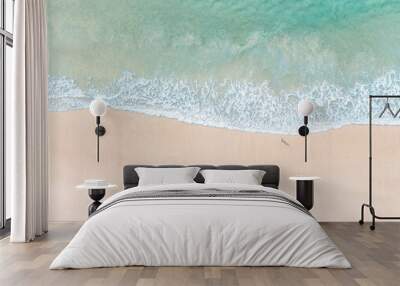 Beautiful beachside destinations pictured with sand, pristine blue water and gentle waves breaking on a beach Wall mural