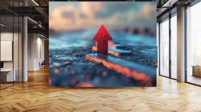 Red upward arrow on wet pavement during sunset with clouds in the background Wall mural