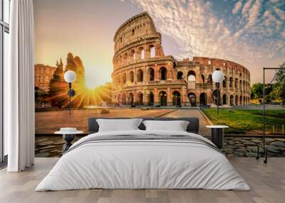 Colosseum in Rome and morning sun, Italy Wall mural