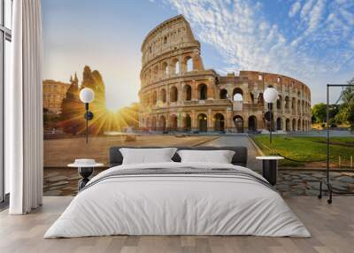 colosseum in rome and morning sun, italy Wall mural