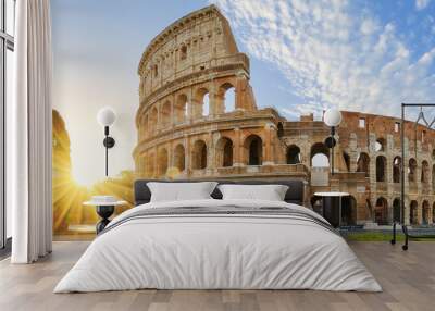 colosseum in rome and morning sun, italy Wall mural