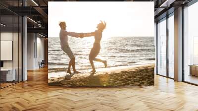 happiness and romantic Scene of love couples partners on the Beach Wall mural