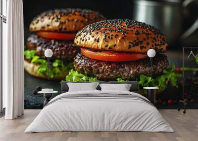 A delicious visual featuring two small burgers with dark buns, one adorned with a striking black ingredient, showcasing an innovative twist on traditional burgers. This appetizing image captures the e Wall mural