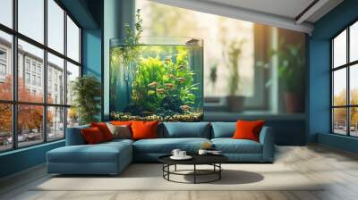 A close-up of a fish tank with orange fish swimming amongst green plants and rocks. Wall mural