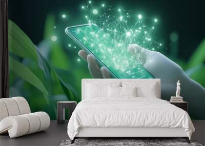 Hand holding a smartphone with a glowing network of lines and dots over a green leafy background. Wall mural