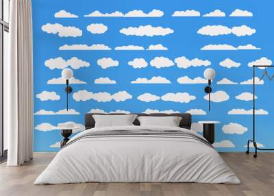 Cloud vector icon set white color on blue background. Sky flat illustration collection for web, art and app design. Different cloudscape weather symbols Wall mural