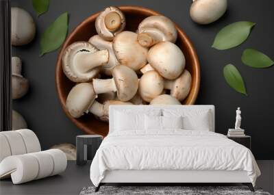 fresh wild mushrooms in bowl on black background, flat lay. Generative Ai Wall mural