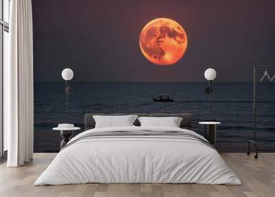 Hunter's Moon - full blood moon over the night ocean Wall mural