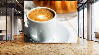 Hot coffee and croissant breakfast in a sunny morning, natural light. Wall mural