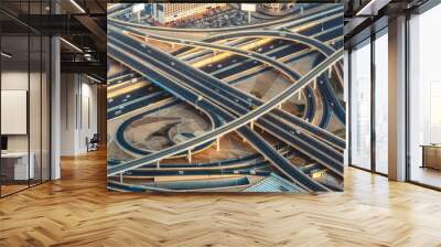 Aerial view of highway junction with little traffic in Dubai, UAE, at sunset. Famous Sheikh Zayed road in Dubai downtown. Transportation and driving concept. Wall mural