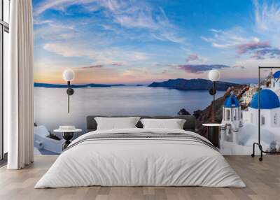 Beautiful panorama view of Santorini island in Greece at sunrise with dramatic sky. Wall mural