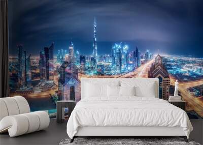 Colourful nighttime skyline of a big modern city. Dubai, United Arab Emirates. Travel background. Wall mural