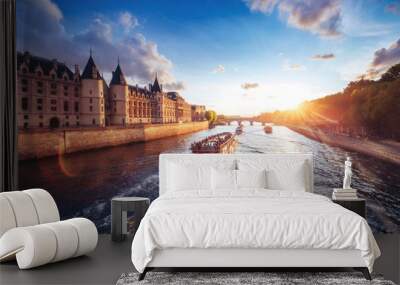 Dramatic sunset over river Seine in Paris, France, with Conciergerie and Pont Neuf. Colourful travel background. Romantic cityscape. Wall mural