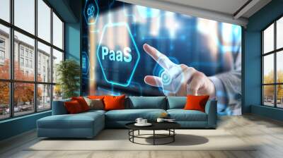 Hand pressing button on interface PaaS, Platform as a Service. Internet and networking concept Wall mural