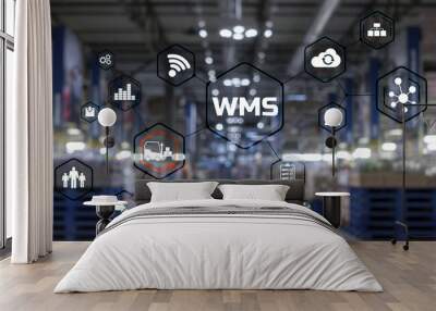 inscription wms on blurred warehouse background. werehouse management system. Wall mural