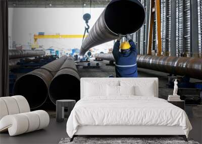 Spiral pipes. Spiral-welded pipe is produced from coils of steel that are unwound and flattened. The flattened strip is formed by angled rollers into a cylinder of the desired diameter. Wall mural