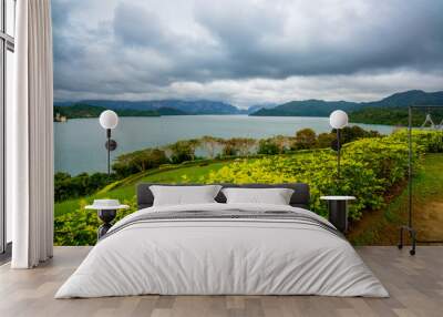 Dam behind a Green Garden with dark cloudy at the Southern of Thailand (Surat Thani) Wall mural