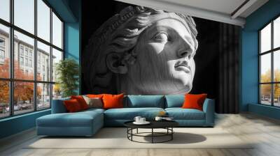 classical greek statue illuminated dramatically chiaroscuro lighting textured marble museum setting timeless beauty Wall mural