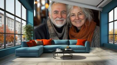 endearing portrait of a senior couple embracing warmly indoors their genuine smiles and affectionate body language capturing the essence of enduring love companionship and joyful aging Wall mural